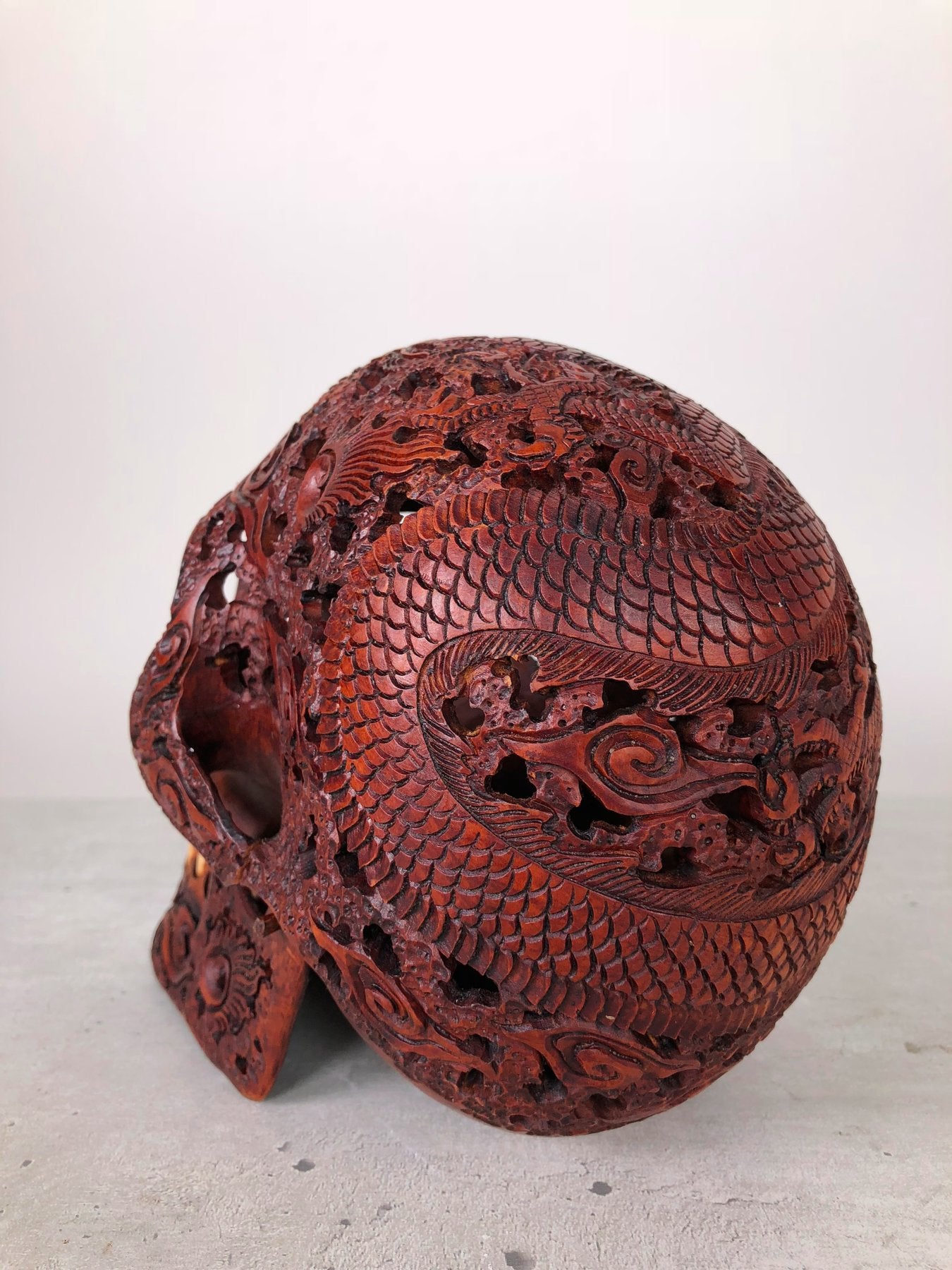 Human skull made of rosewood, carved and engraved