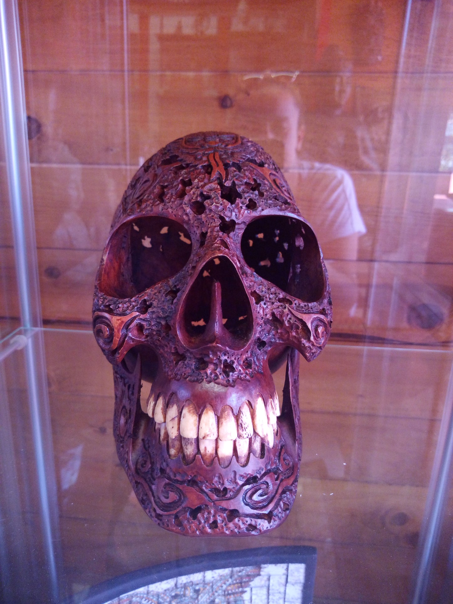 Human skull made of rosewood, carved and engraved