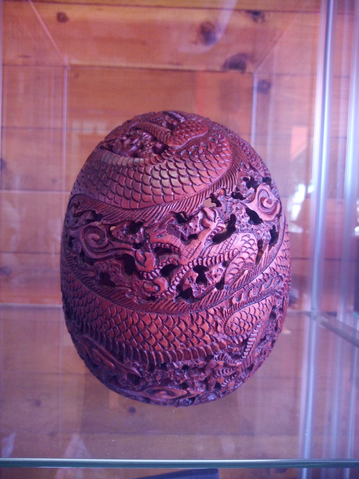 Human skull made of rosewood, carved and engraved
