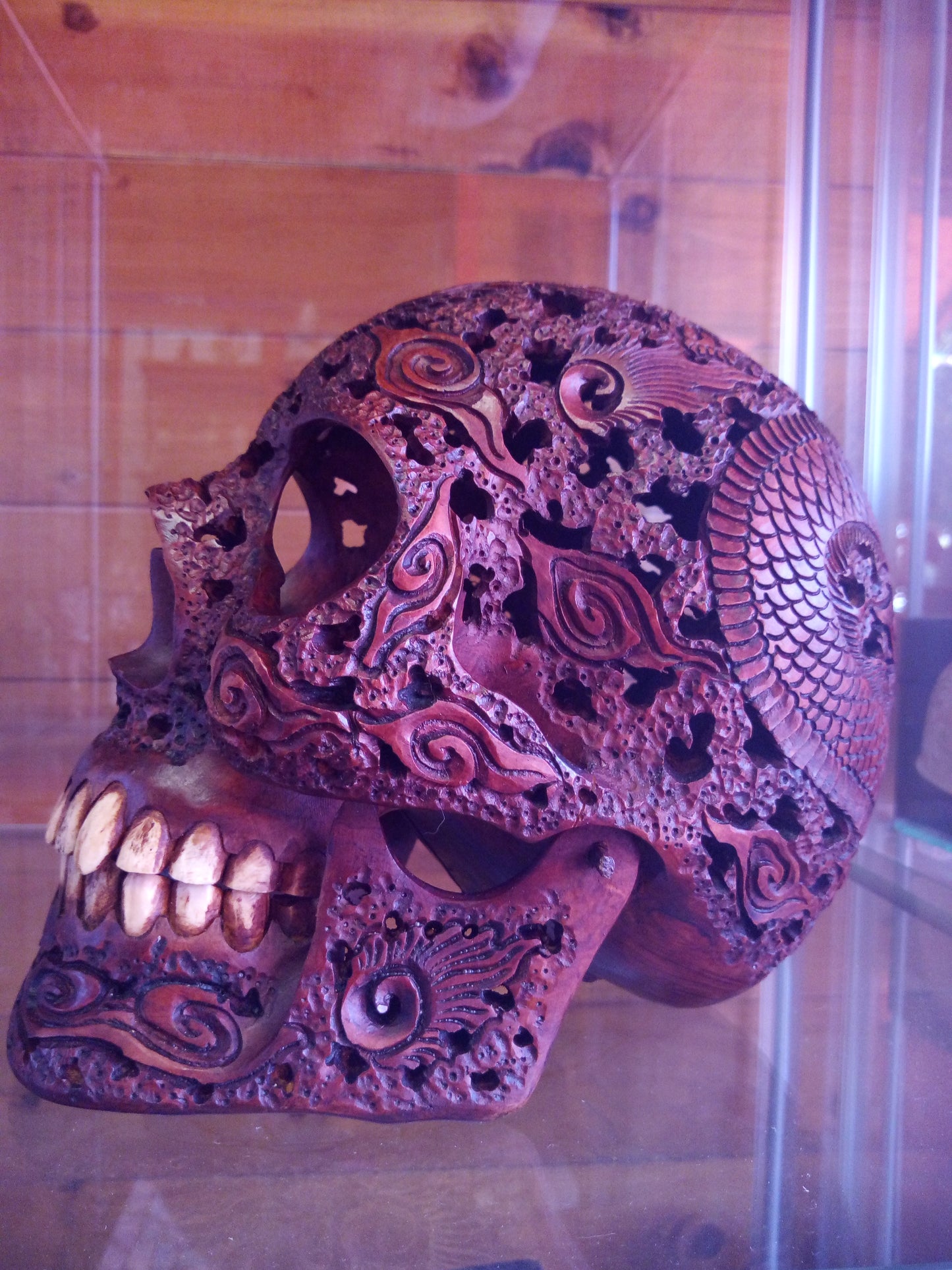 Human skull made of rosewood, carved and engraved
