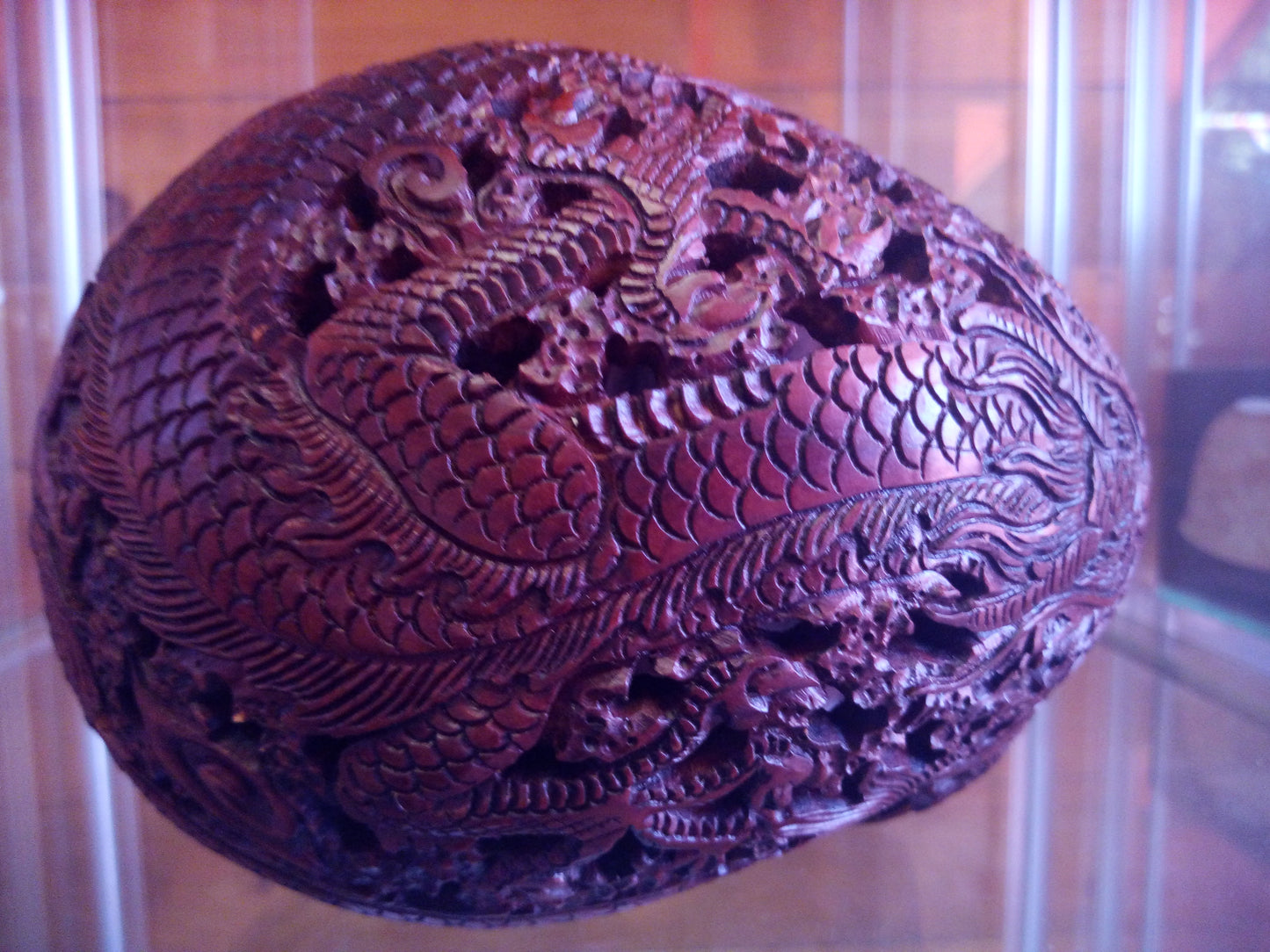 Human skull made of rosewood, carved and engraved