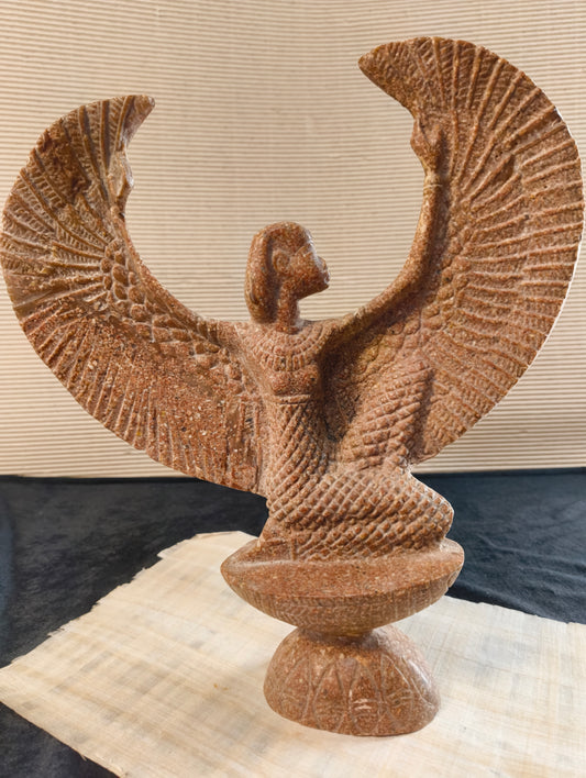 Winged Isis - Egyptian goddess in red granite from Aswan