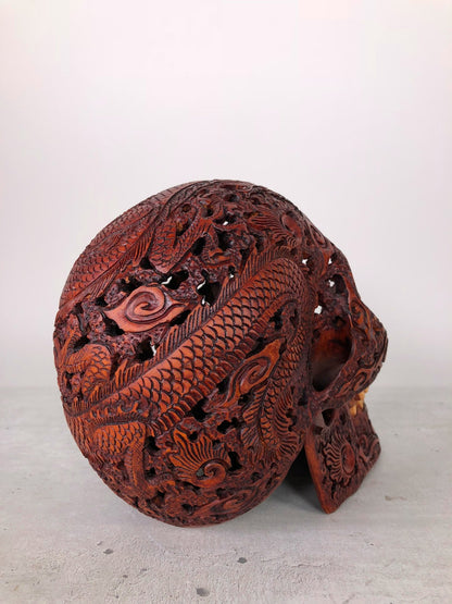 Human skull made of rosewood, carved and engraved 