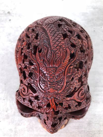 Human skull made of rosewood, carved and engraved 